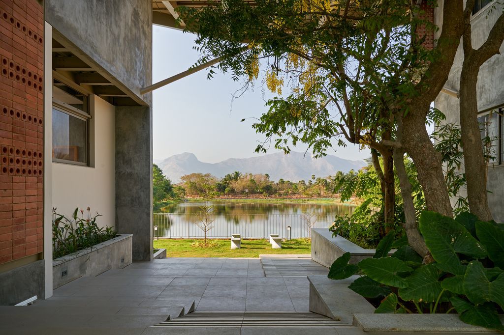 Athachi Farmhouse with Raw, Earthy Tone Exterior by Alchemy Architects