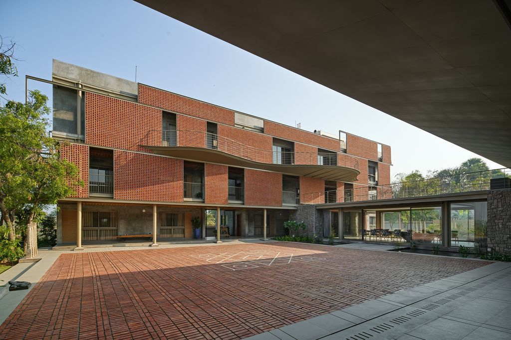 Athachi Farmhouse with Raw, Earthy Tone Exterior by Alchemy Architects