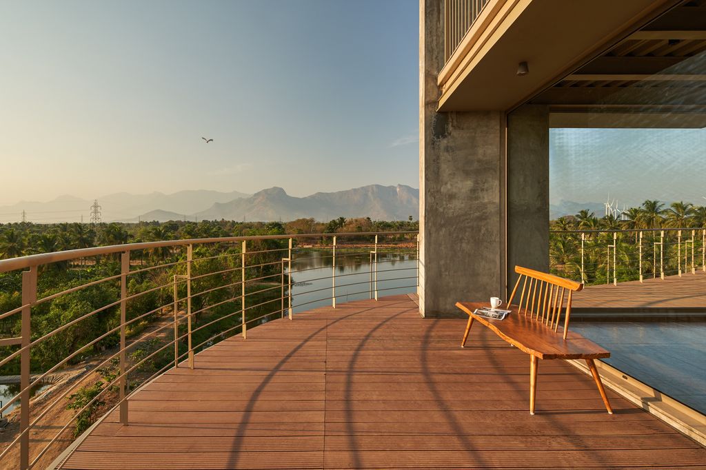 Athachi Farmhouse with Raw, Earthy Tone Exterior by Alchemy Architects