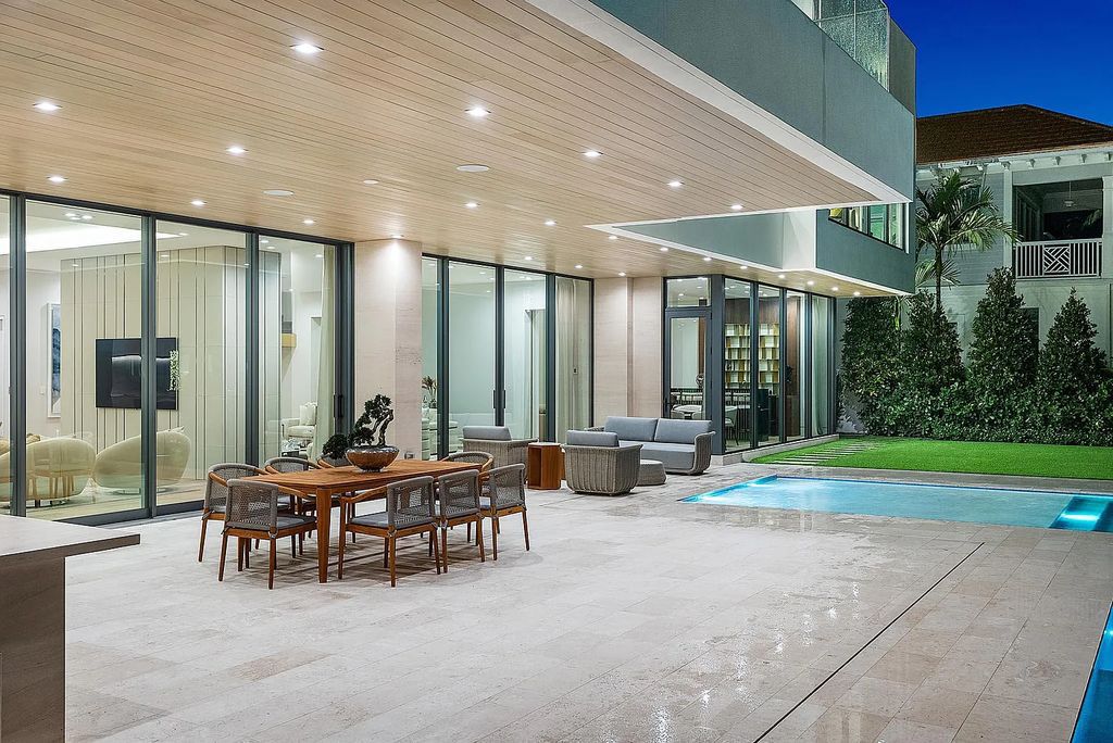 Discover this awe-inspiring waterfront estate at 224 W Key Palm Road, Boca Raton, Florida. Built in 2023 by Sarkela Corp and Ada Architecture Design Atelier, this luxurious property boasts 6 opulent bedrooms, 7 full and 2 half baths, and over 9,500 sq ft of palatial living space.