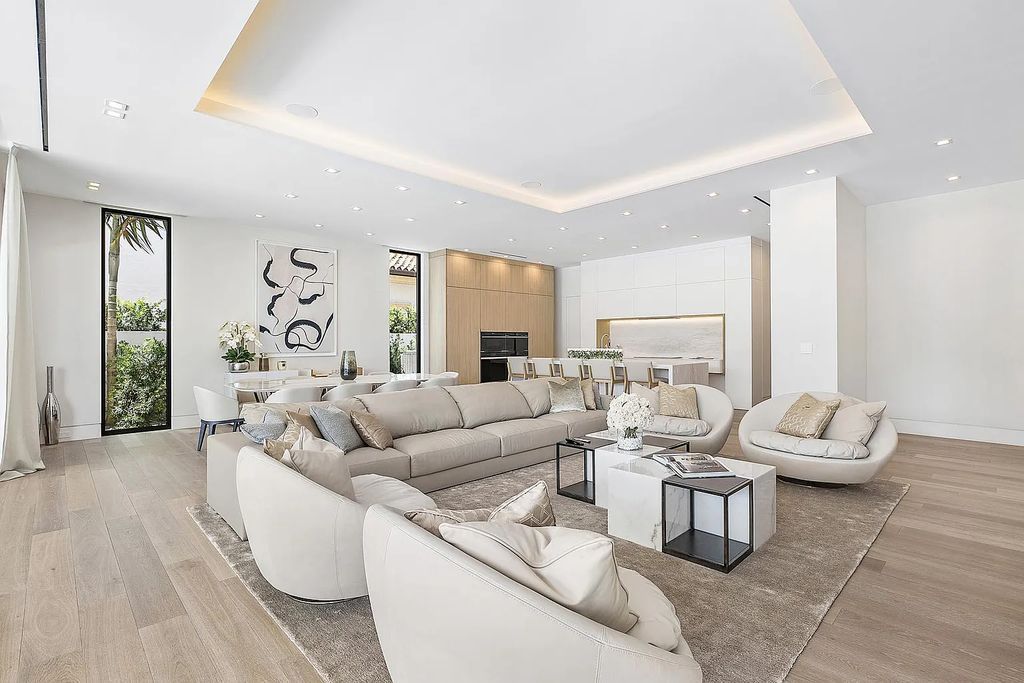 Discover this awe-inspiring waterfront estate at 224 W Key Palm Road, Boca Raton, Florida. Built in 2023 by Sarkela Corp and Ada Architecture Design Atelier, this luxurious property boasts 6 opulent bedrooms, 7 full and 2 half baths, and over 9,500 sq ft of palatial living space.
