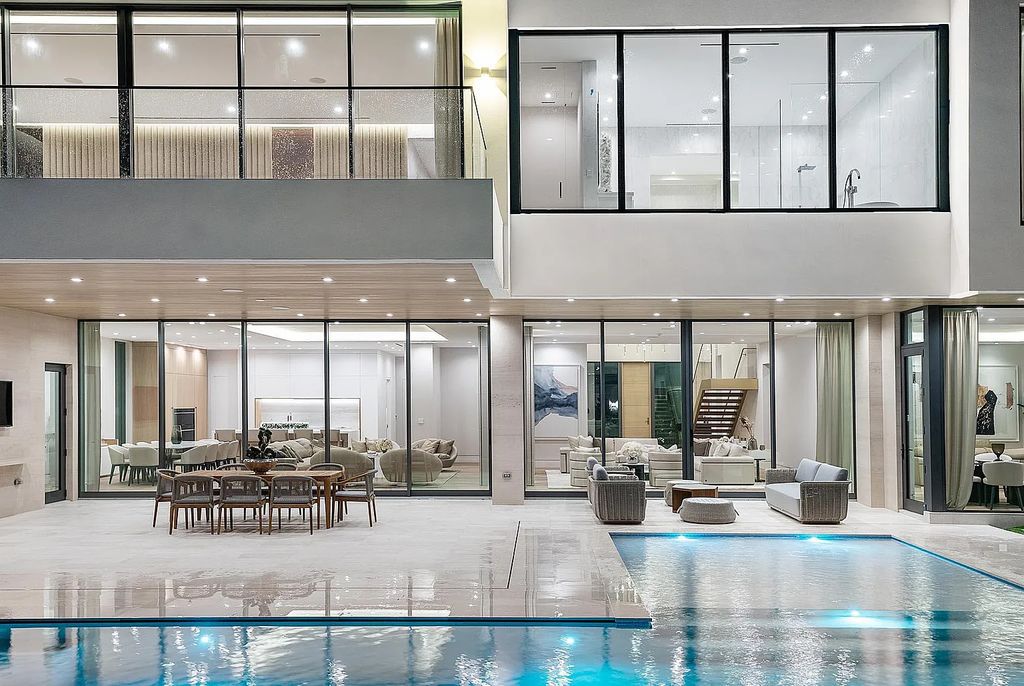 Discover this awe-inspiring waterfront estate at 224 W Key Palm Road, Boca Raton, Florida. Built in 2023 by Sarkela Corp and Ada Architecture Design Atelier, this luxurious property boasts 6 opulent bedrooms, 7 full and 2 half baths, and over 9,500 sq ft of palatial living space.