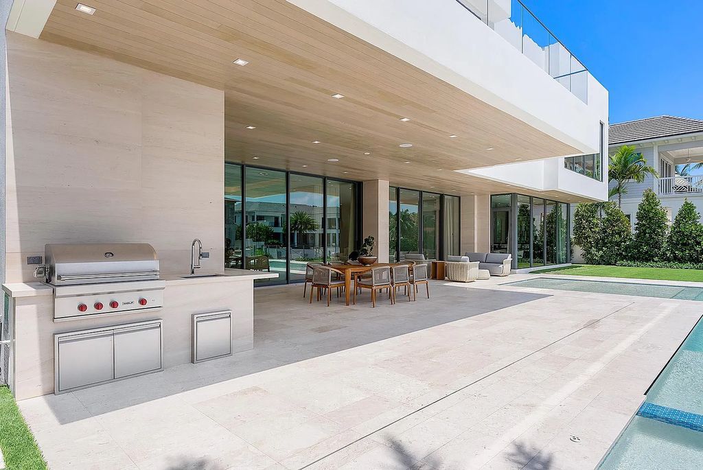 Discover this awe-inspiring waterfront estate at 224 W Key Palm Road, Boca Raton, Florida. Built in 2023 by Sarkela Corp and Ada Architecture Design Atelier, this luxurious property boasts 6 opulent bedrooms, 7 full and 2 half baths, and over 9,500 sq ft of palatial living space.