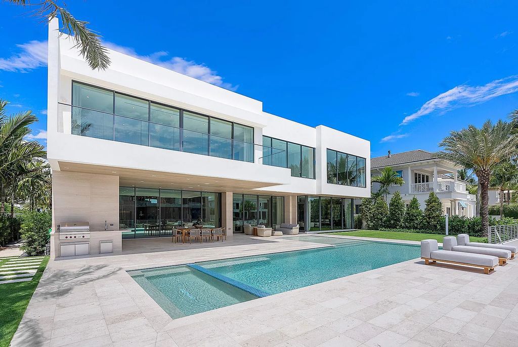Discover this awe-inspiring waterfront estate at 224 W Key Palm Road, Boca Raton, Florida. Built in 2023 by Sarkela Corp and Ada Architecture Design Atelier, this luxurious property boasts 6 opulent bedrooms, 7 full and 2 half baths, and over 9,500 sq ft of palatial living space.