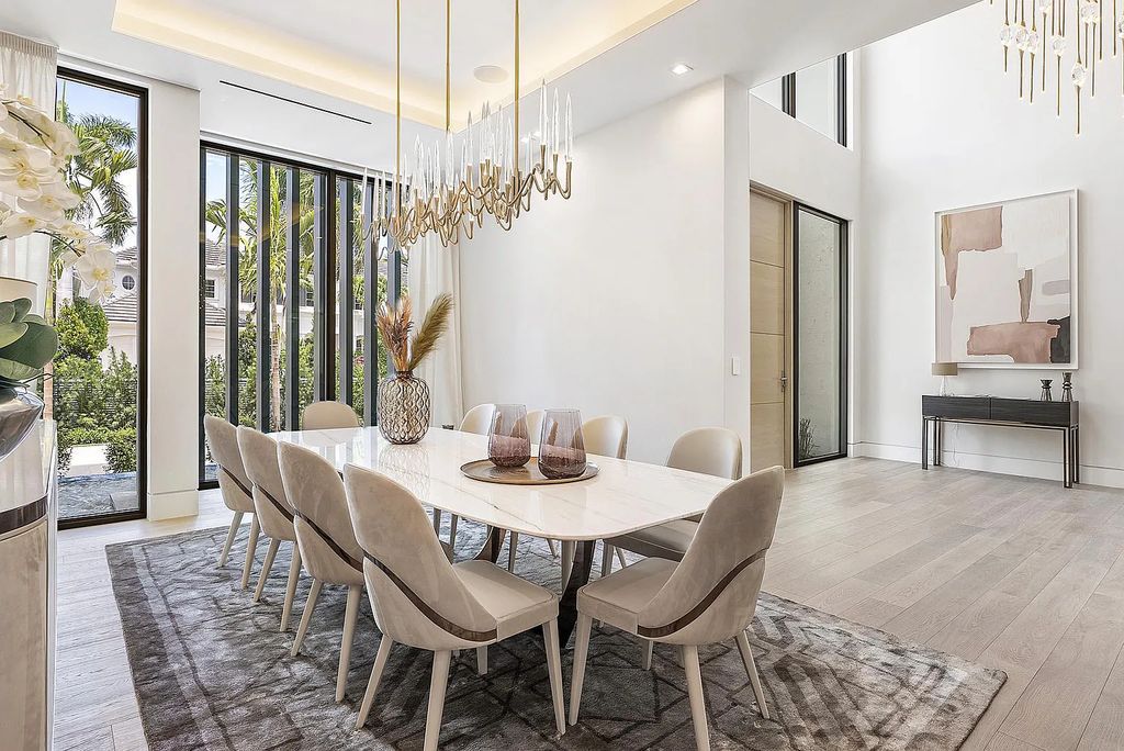 Discover this awe-inspiring waterfront estate at 224 W Key Palm Road, Boca Raton, Florida. Built in 2023 by Sarkela Corp and Ada Architecture Design Atelier, this luxurious property boasts 6 opulent bedrooms, 7 full and 2 half baths, and over 9,500 sq ft of palatial living space.