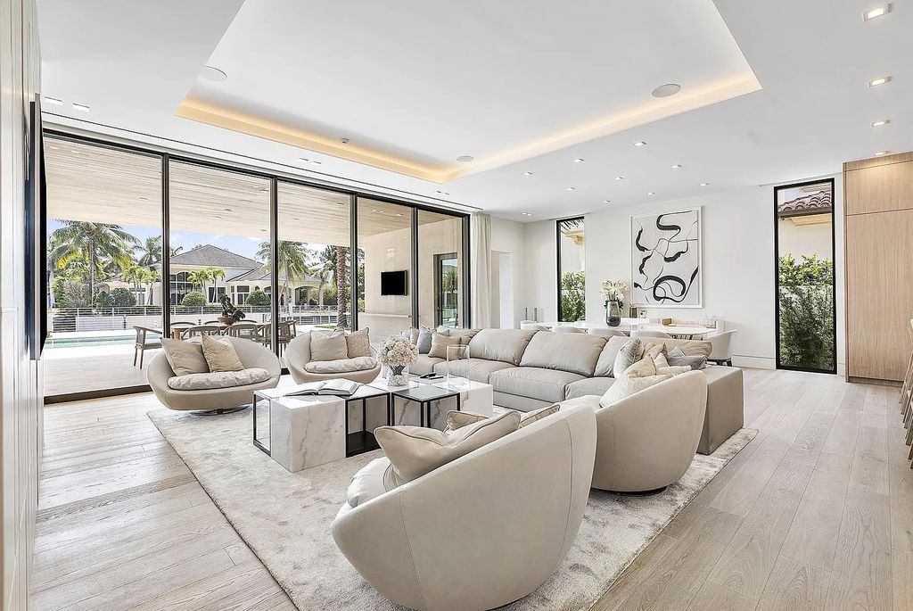 Discover this awe-inspiring waterfront estate at 224 W Key Palm Road, Boca Raton, Florida. Built in 2023 by Sarkela Corp and Ada Architecture Design Atelier, this luxurious property boasts 6 opulent bedrooms, 7 full and 2 half baths, and over 9,500 sq ft of palatial living space.