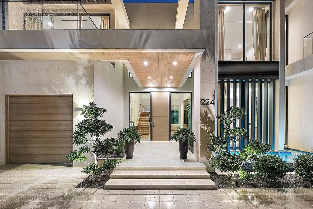 Discover this awe-inspiring waterfront estate at 224 W Key Palm Road, Boca Raton, Florida. Built in 2023 by Sarkela Corp and Ada Architecture Design Atelier, this luxurious property boasts 6 opulent bedrooms, 7 full and 2 half baths, and over 9,500 sq ft of palatial living space.