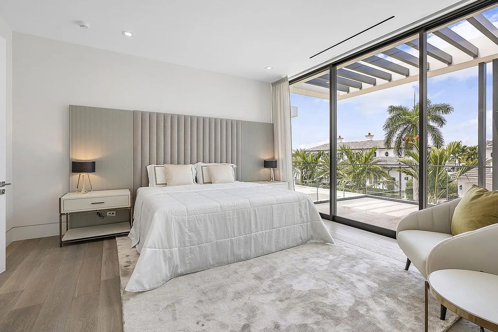Discover this awe-inspiring waterfront estate at 224 W Key Palm Road, Boca Raton, Florida. Built in 2023 by Sarkela Corp and Ada Architecture Design Atelier, this luxurious property boasts 6 opulent bedrooms, 7 full and 2 half baths, and over 9,500 sq ft of palatial living space.