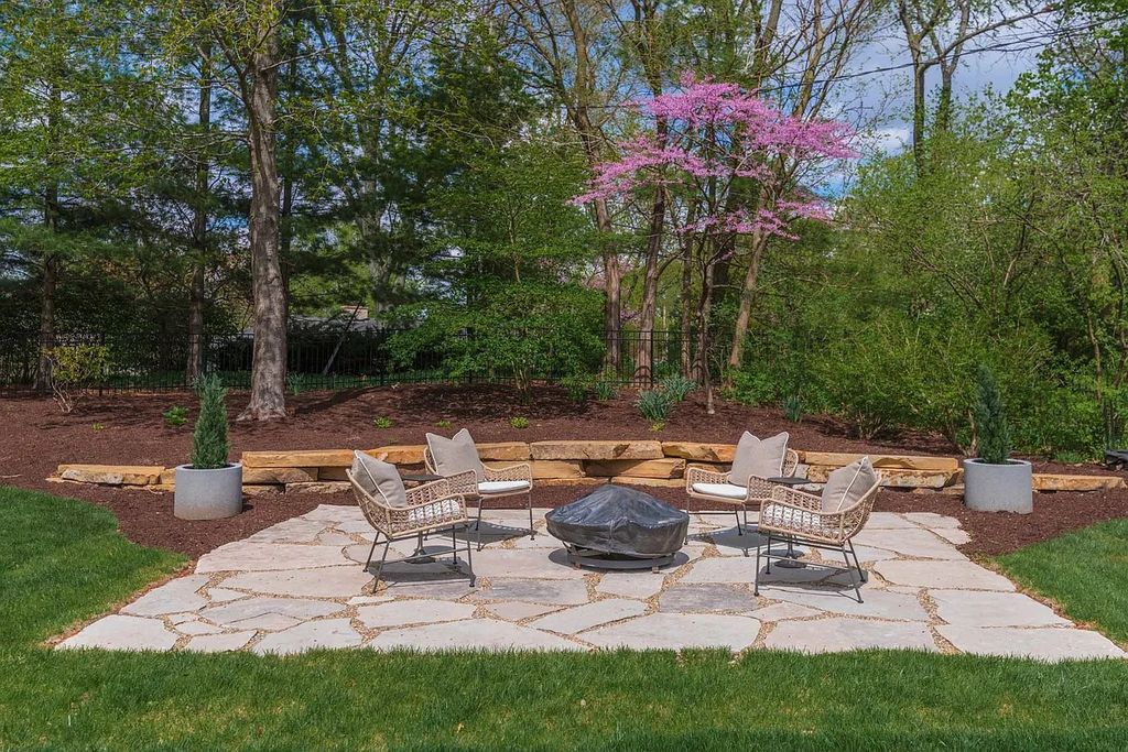 Breathtaking Story Stone Home with Exceptional Landscaping in Bloomington, IL - Priced at $2.249M