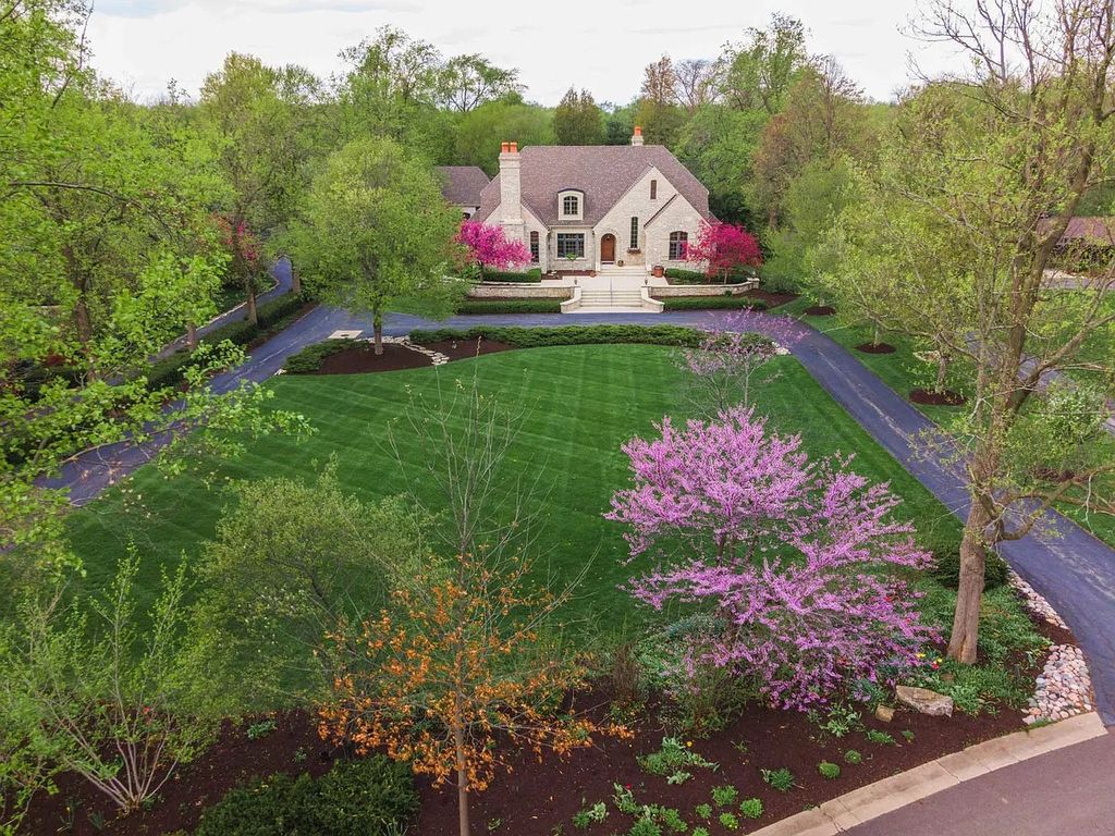 Breathtaking Story Stone Home with Exceptional Landscaping in Bloomington, IL - Priced at $2.249M