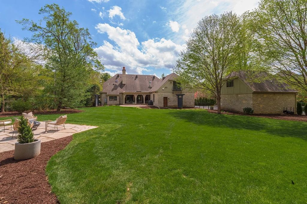 Breathtaking Story Stone Home with Exceptional Landscaping in Bloomington, IL - Priced at $2.249M
