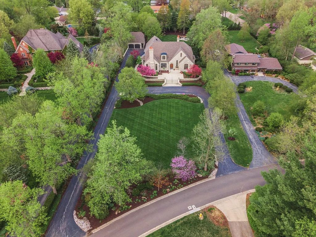 Breathtaking Story Stone Home with Exceptional Landscaping in Bloomington, IL - Priced at $2.249M