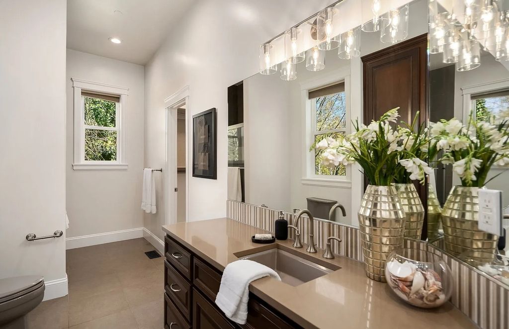 Exceptional Des Moines, WA Residence: A Private Oasis with Stunning Views, Timeless Style, and a Price of $2.995M