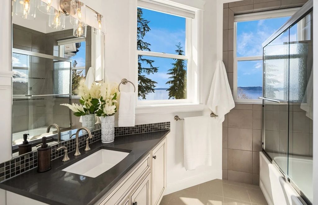 Exceptional Des Moines, WA Residence: A Private Oasis with Stunning Views, Timeless Style, and a Price of $2.995M