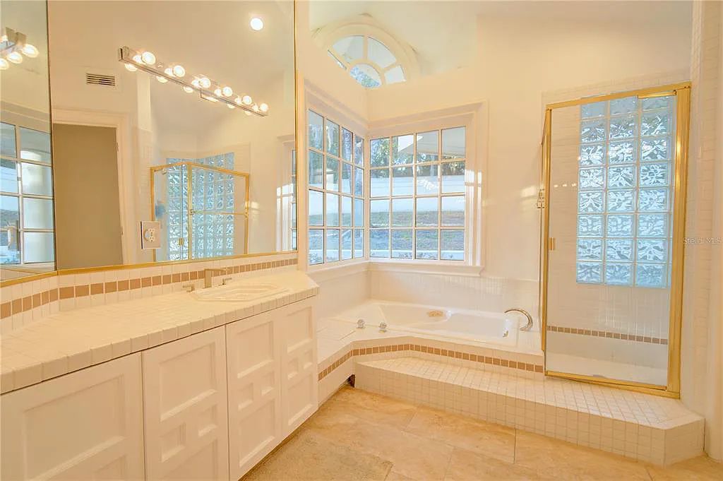 Discover the stunning 6-bed, 8-bath estate at 400 Saddleworth Place in Lake Mary, Florida. Situated on 2.82 acres within Heathrow's premier community, this custom-built home offers over 9,000 sqft of luxurious living space.