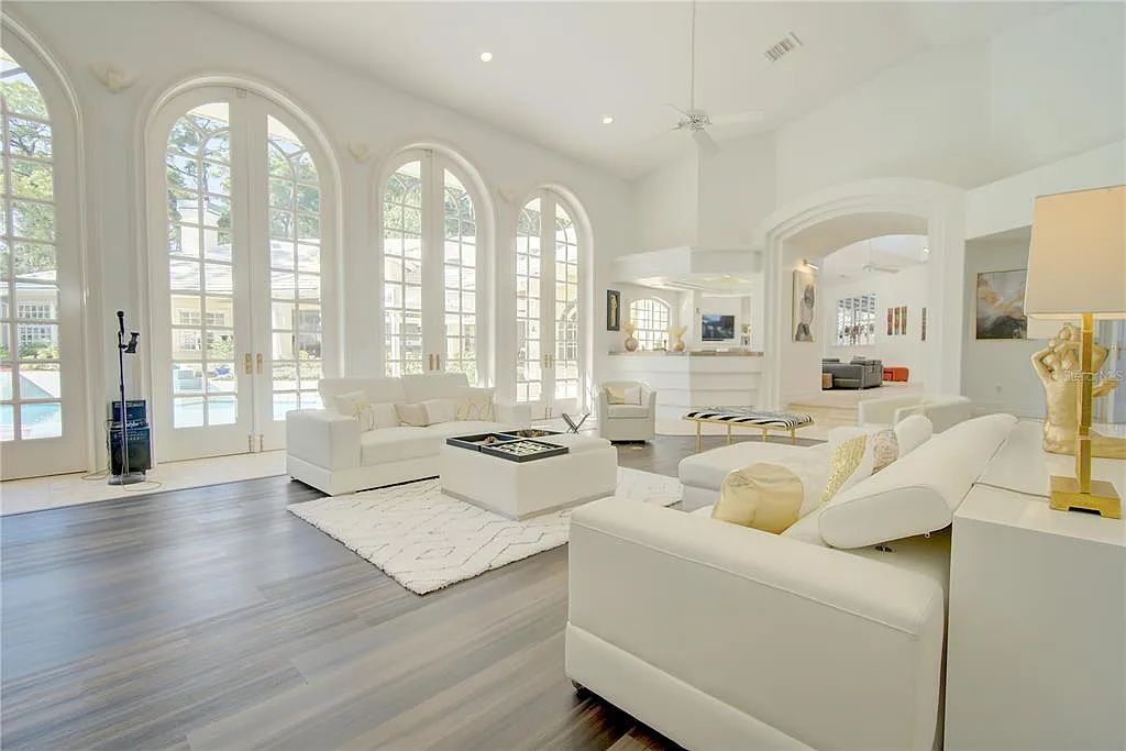 Discover the stunning 6-bed, 8-bath estate at 400 Saddleworth Place in Lake Mary, Florida. Situated on 2.82 acres within Heathrow's premier community, this custom-built home offers over 9,000 sqft of luxurious living space.
