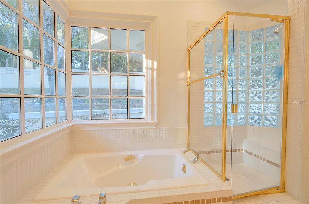 Discover the stunning 6-bed, 8-bath estate at 400 Saddleworth Place in Lake Mary, Florida. Situated on 2.82 acres within Heathrow's premier community, this custom-built home offers over 9,000 sqft of luxurious living space.