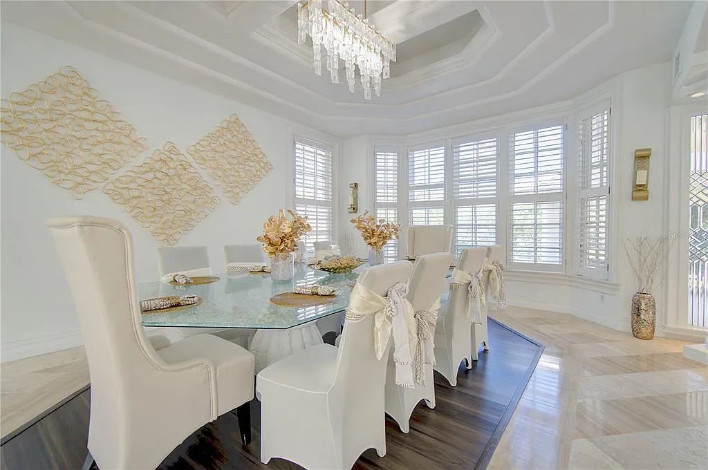 Discover the stunning 6-bed, 8-bath estate at 400 Saddleworth Place in Lake Mary, Florida. Situated on 2.82 acres within Heathrow's premier community, this custom-built home offers over 9,000 sqft of luxurious living space.