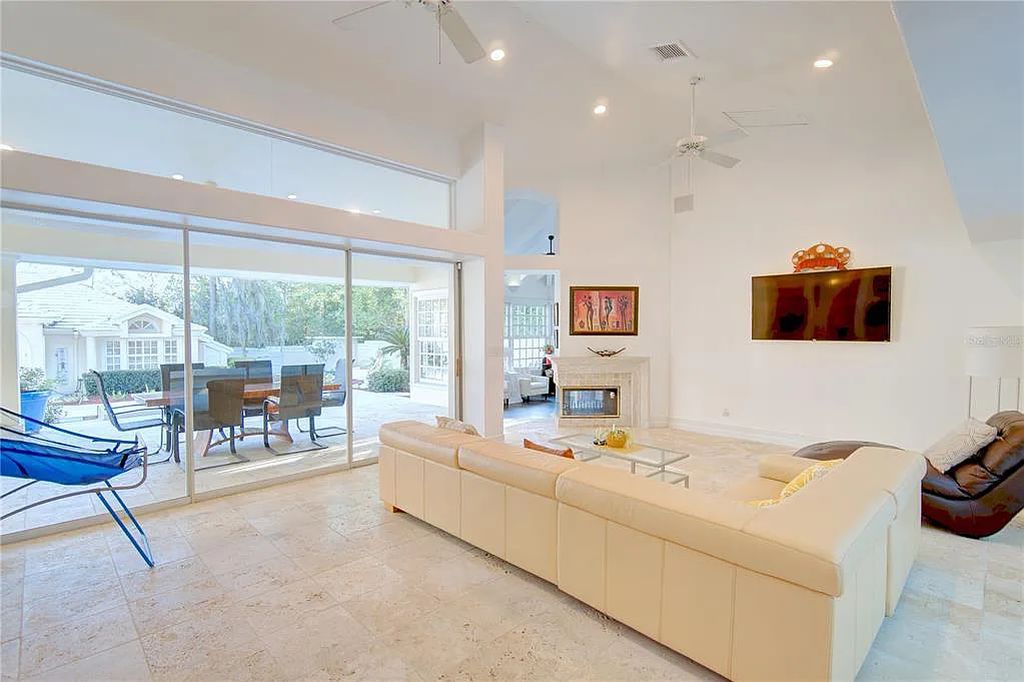 Discover the stunning 6-bed, 8-bath estate at 400 Saddleworth Place in Lake Mary, Florida. Situated on 2.82 acres within Heathrow's premier community, this custom-built home offers over 9,000 sqft of luxurious living space.