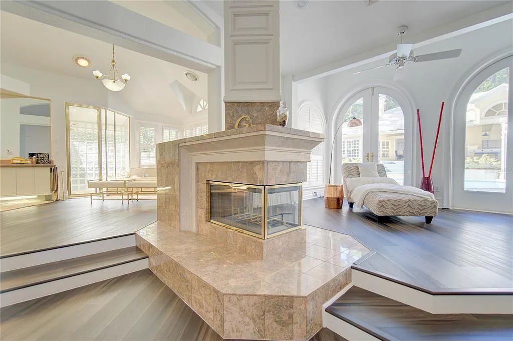 Discover the stunning 6-bed, 8-bath estate at 400 Saddleworth Place in Lake Mary, Florida. Situated on 2.82 acres within Heathrow's premier community, this custom-built home offers over 9,000 sqft of luxurious living space.