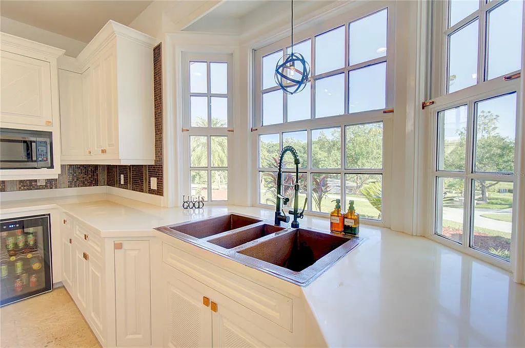 Discover the stunning 6-bed, 8-bath estate at 400 Saddleworth Place in Lake Mary, Florida. Situated on 2.82 acres within Heathrow's premier community, this custom-built home offers over 9,000 sqft of luxurious living space.