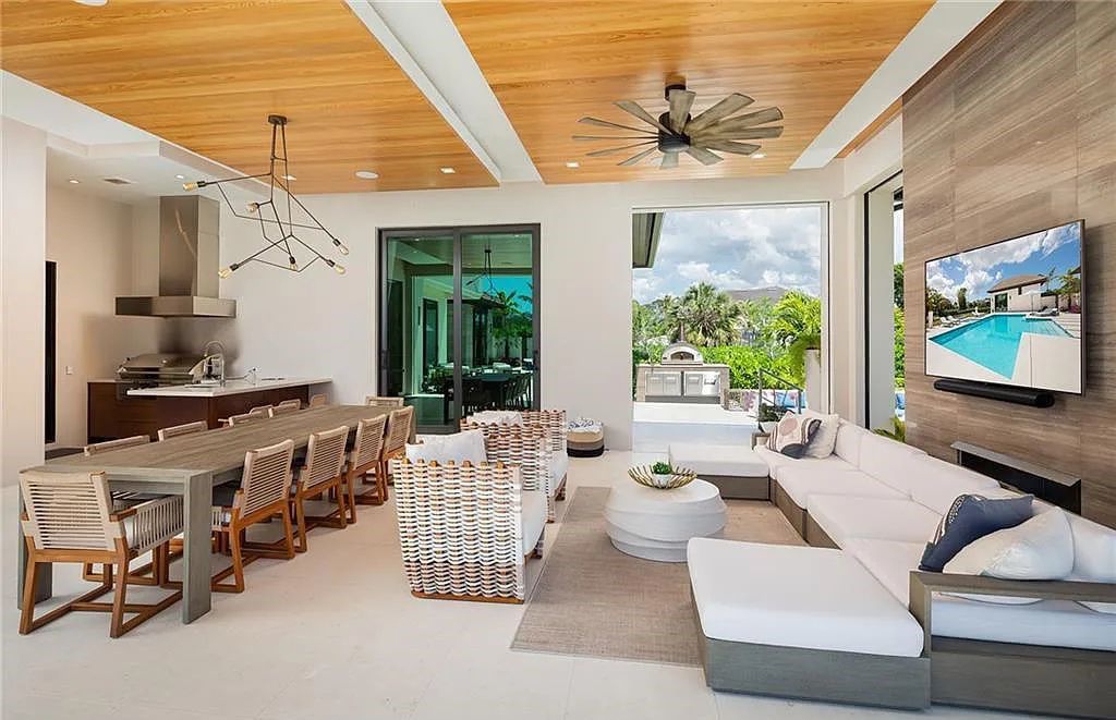 146 Myrtle Road, Naples, Florida newly completed, custom contemporary Pine Ridge estate boasts 6 beds, 10 baths, 7,238 sq ft of living space on a 1.21-acre lot.