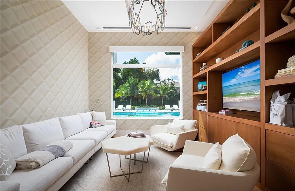 146 Myrtle Road, Naples, Florida newly completed, custom contemporary Pine Ridge estate boasts 6 beds, 10 baths, 7,238 sq ft of living space on a 1.21-acre lot.
