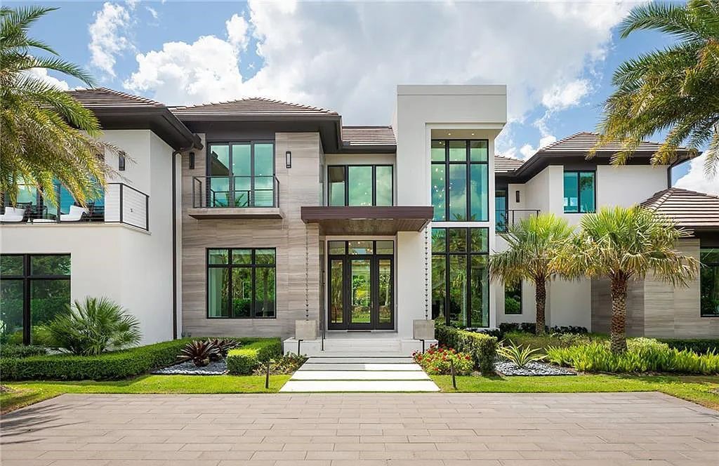 146 Myrtle Road, Naples, Florida newly completed, custom contemporary Pine Ridge estate boasts 6 beds, 10 baths, 7,238 sq ft of living space on a 1.21-acre lot.