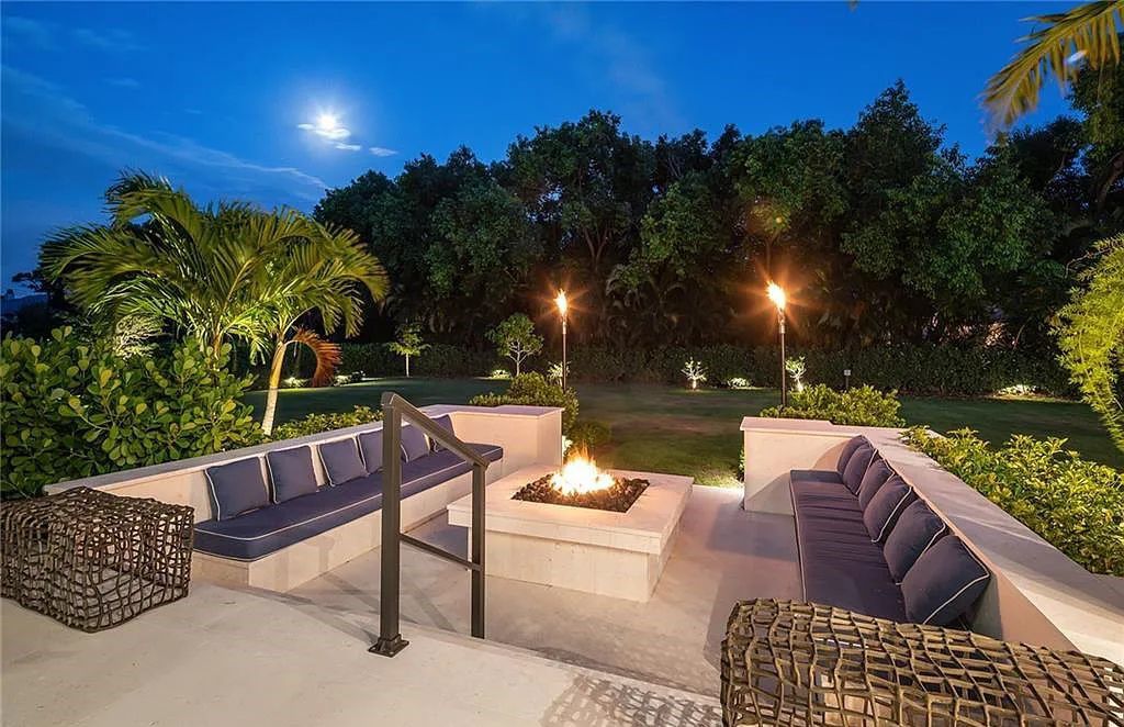 146 Myrtle Road, Naples, Florida newly completed, custom contemporary Pine Ridge estate boasts 6 beds, 10 baths, 7,238 sq ft of living space on a 1.21-acre lot.