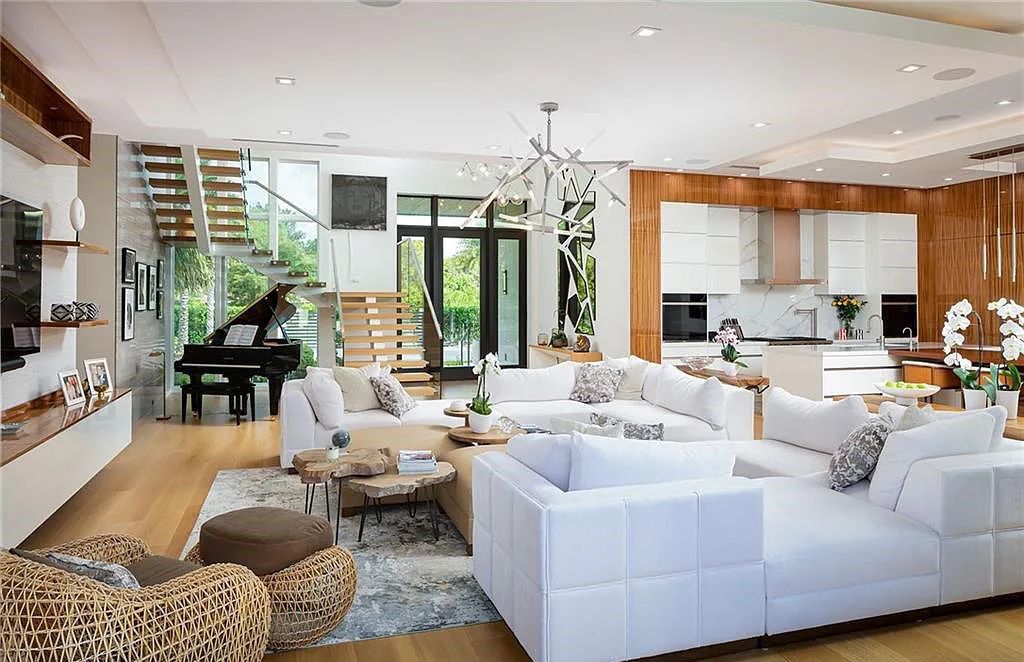 146 Myrtle Road, Naples, Florida newly completed, custom contemporary Pine Ridge estate boasts 6 beds, 10 baths, 7,238 sq ft of living space on a 1.21-acre lot.