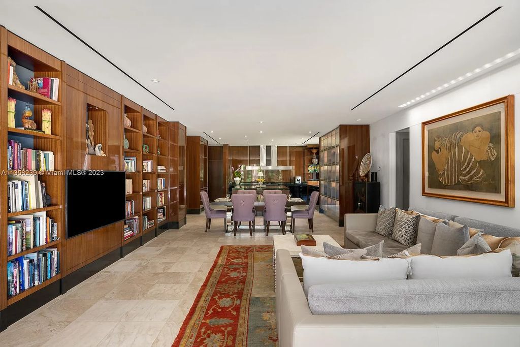 Experience unparalleled luxury in this lakefront estate located at 10201 Sabal Palm Avenue, Coral Gables, Florida. With 5 bedrooms, 7 bathrooms, and 2 half-bathrooms, this sprawling 9,266 sq ft home boasts an infinity saltwater pool, custom-designed kitchen, and floor-to-ceiling windows.