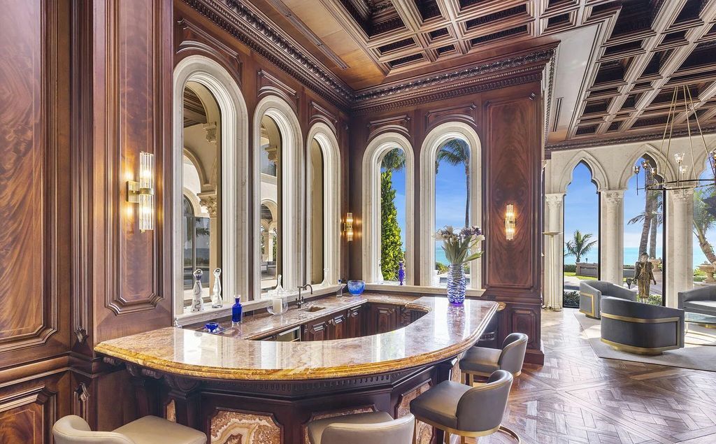 Located at 2325 S Ocean Boulevard in Delray Beach, Florida, this custom-built estate is a one-of-a-kind property. Boasting 9 bedrooms, 13.7 bathrooms, and stunning ocean views, it offers a range of luxurious features, including intricate marblework, artisan millwork, and custom finishes.