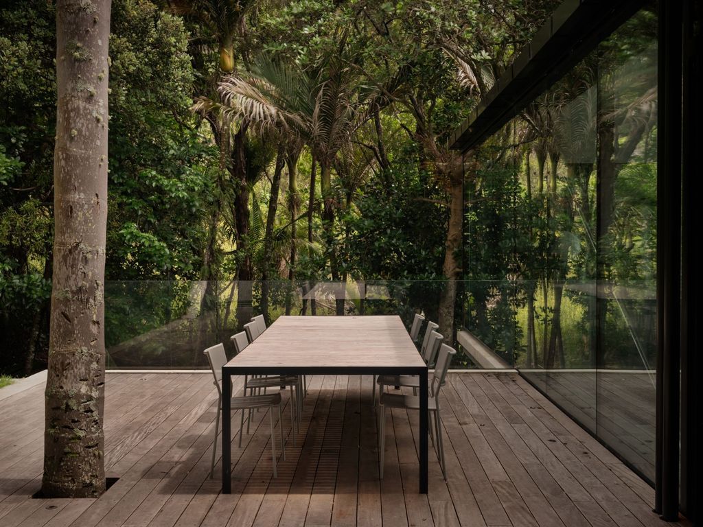 Mahuika House with spaces extend over the pool below by Daniel Marshall