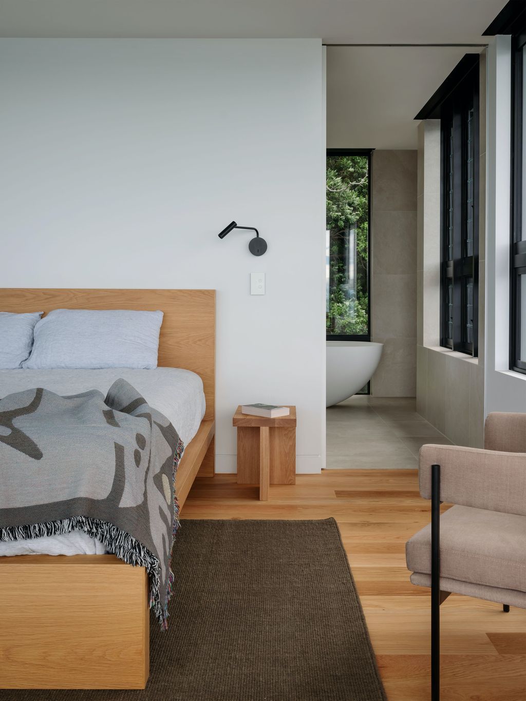 Mahuika House with spaces extend over the pool below by Daniel Marshall
