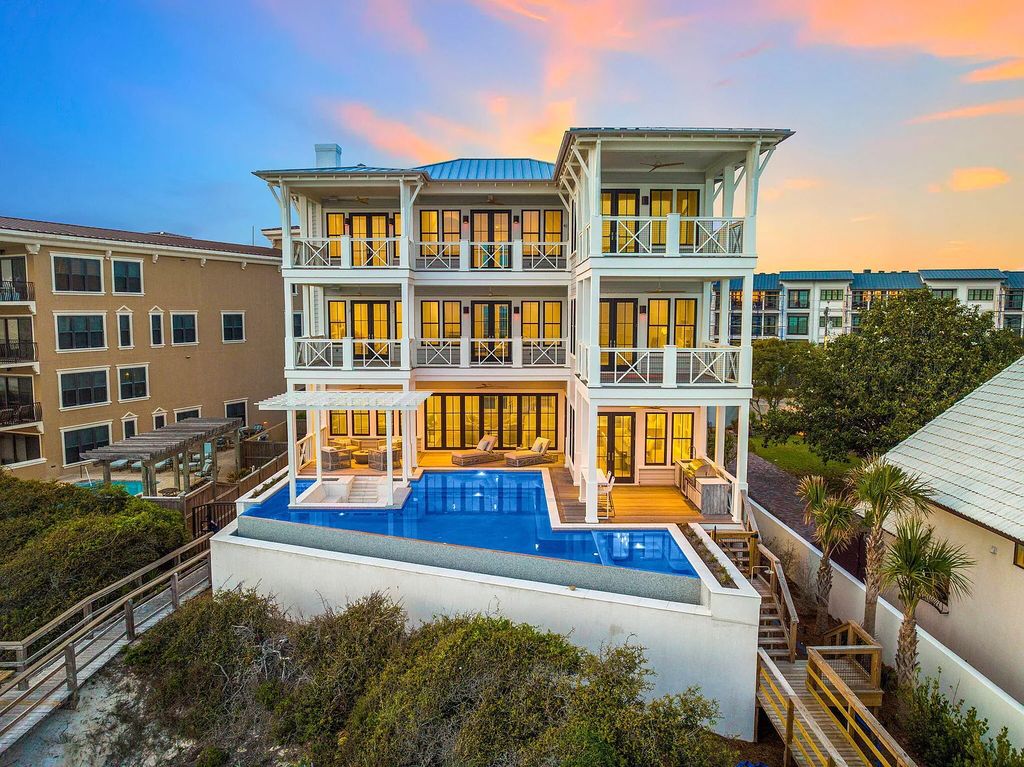 Discover an extraordinary legacy estate in 8364 E County Highway 30a, Inlet Beach, Florida featuring 9 bedrooms, 10 baths, and 7,966 sqft of living space with impeccable coastal design by Allison Ramsey and interiors by Erika Powell at Urban Grace Design.