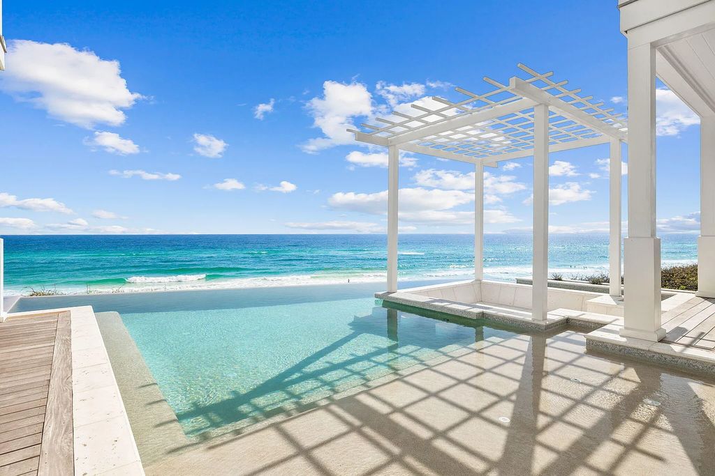 Discover an extraordinary legacy estate in 8364 E County Highway 30a, Inlet Beach, Florida featuring 9 bedrooms, 10 baths, and 7,966 sqft of living space with impeccable coastal design by Allison Ramsey and interiors by Erika Powell at Urban Grace Design.