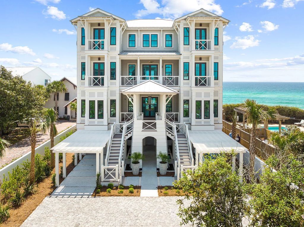 Discover an extraordinary legacy estate in 8364 E County Highway 30a, Inlet Beach, Florida featuring 9 bedrooms, 10 baths, and 7,966 sqft of living space with impeccable coastal design by Allison Ramsey and interiors by Erika Powell at Urban Grace Design.