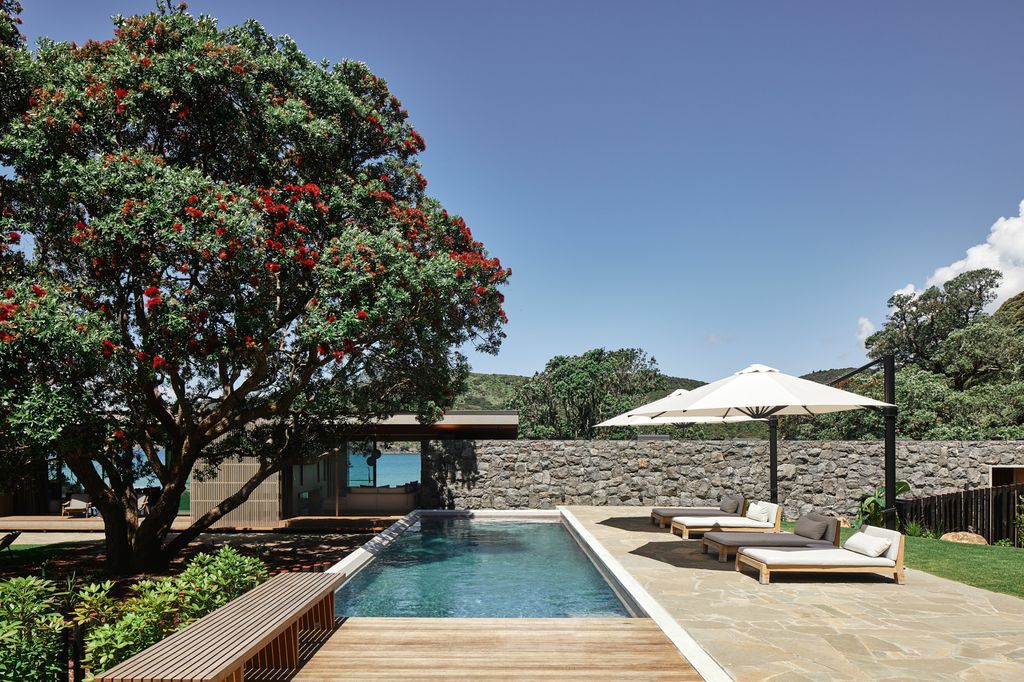 Omata Beach House offers breathtaking ocean views by Herbst Architects