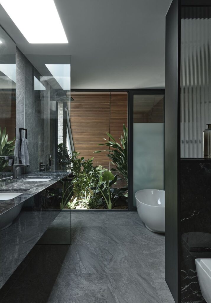 Outside In House seamlessly integrates with nature by HYLA Architects 1