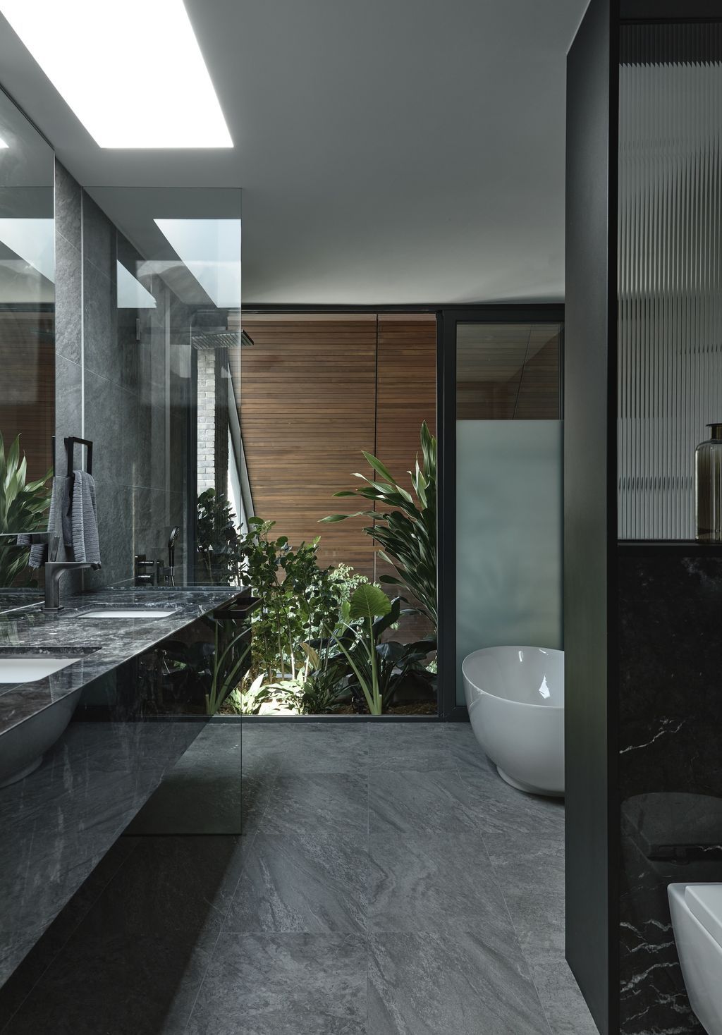 Outside In House seamlessly integrates with nature by HYLA Architects 1