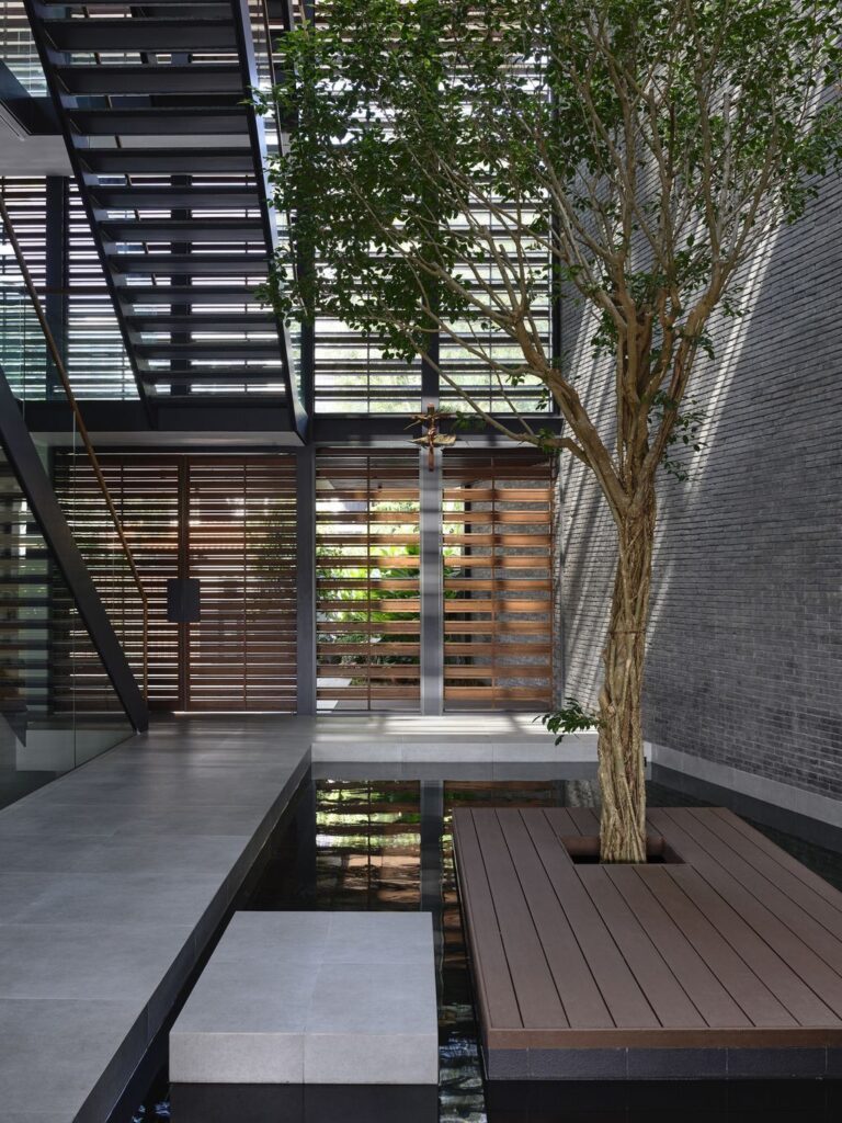 Outside In House seamlessly integrates with nature by HYLA Architects 11