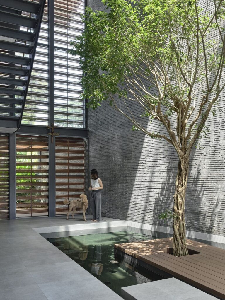 Outside In House seamlessly integrates with nature by HYLA Architects 12