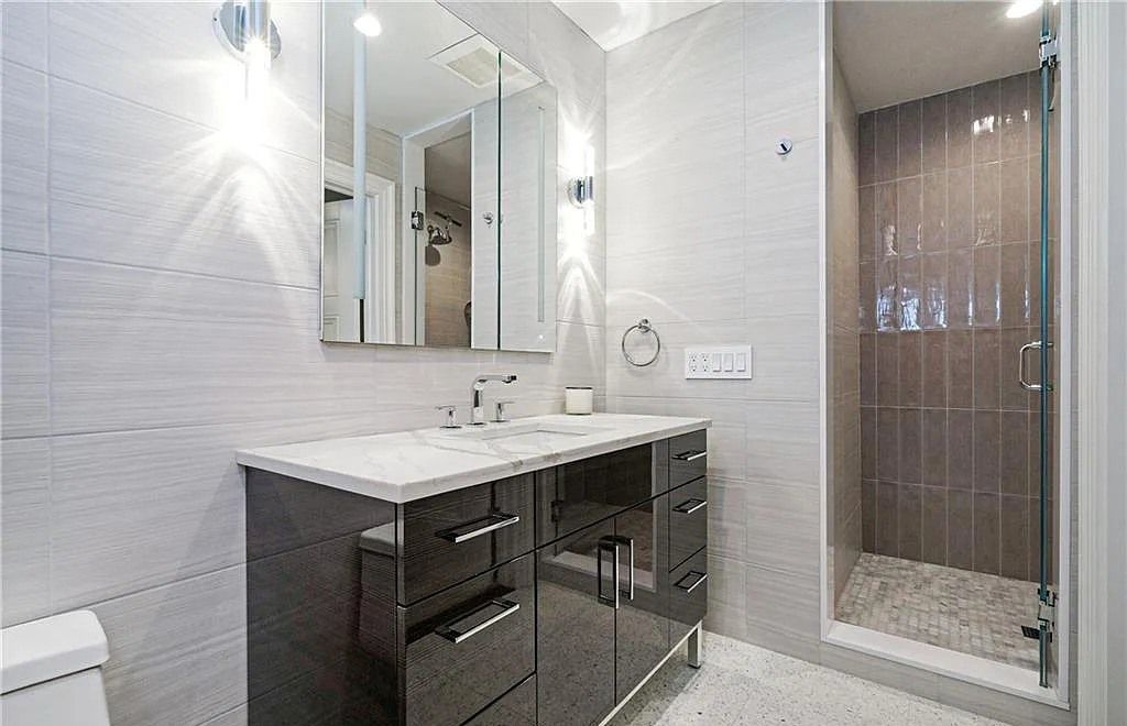 Scarsdale, NY's Iconic Tudor Home with 3 Levels of Modern Amenities, Exquisite Finishes, and Masterful Millwork for Sale at $6.8M