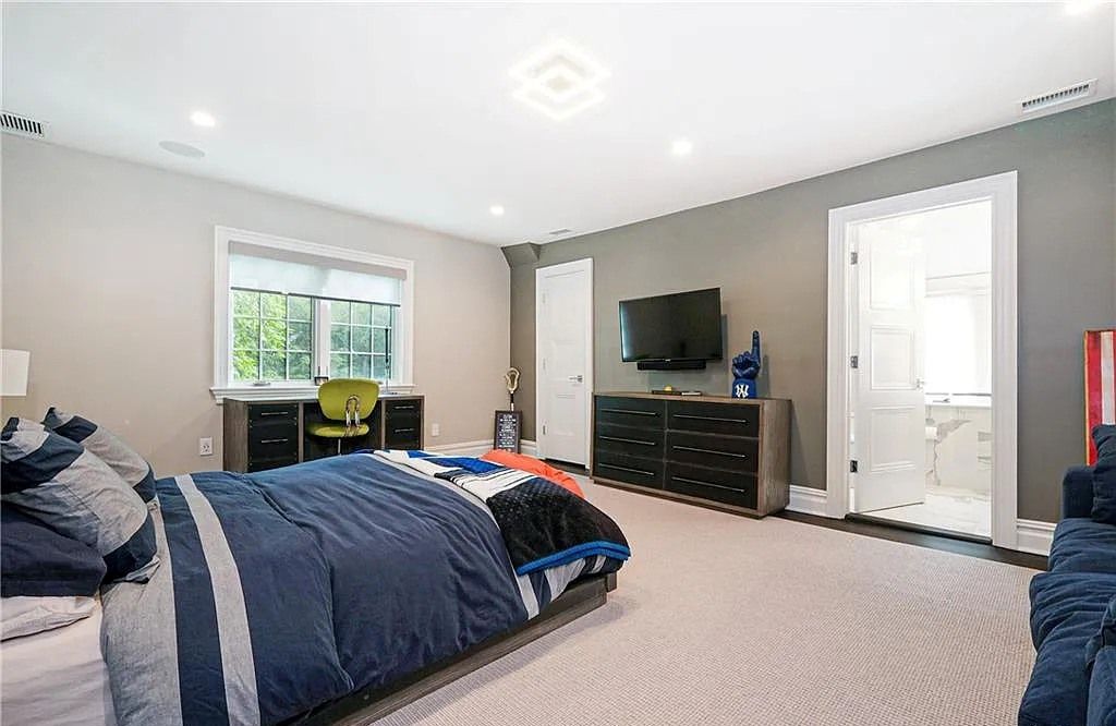 Scarsdale, NY's Iconic Tudor Home with 3 Levels of Modern Amenities, Exquisite Finishes, and Masterful Millwork for Sale at $6.8M
