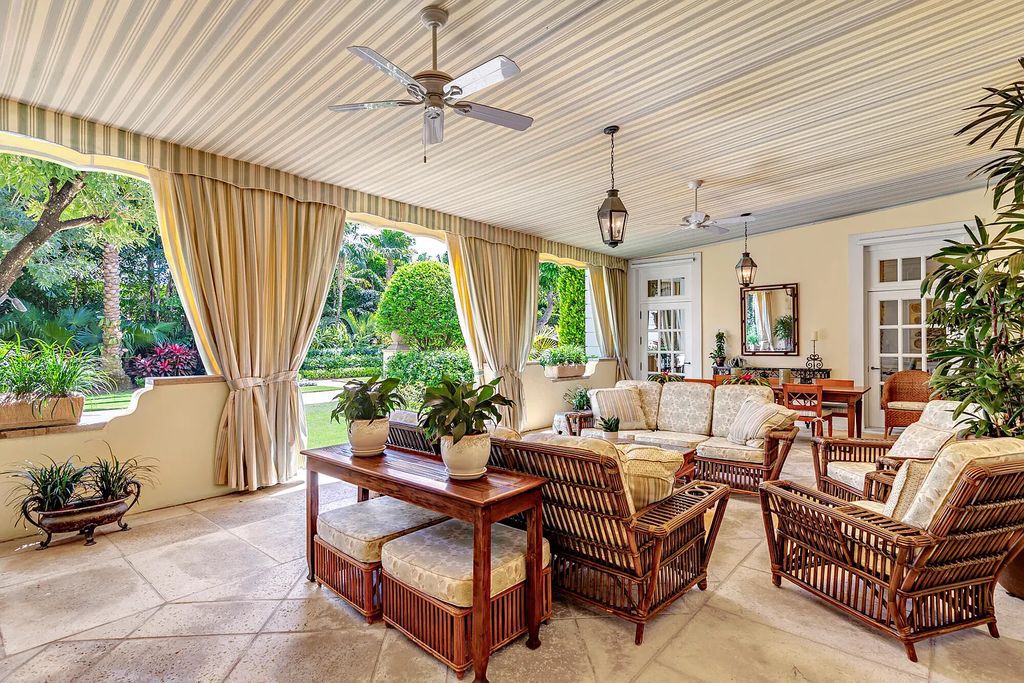 Welcome to 120 Via Del Lago, Palm Beach, Florida a Marion Sims Wyeth designed classic masterpiece. This 13,000+ sq ft Estate boasts 7 beds, 12 baths, expansive indoor/outdoor living areas, gardens, pool and separate guest house.
