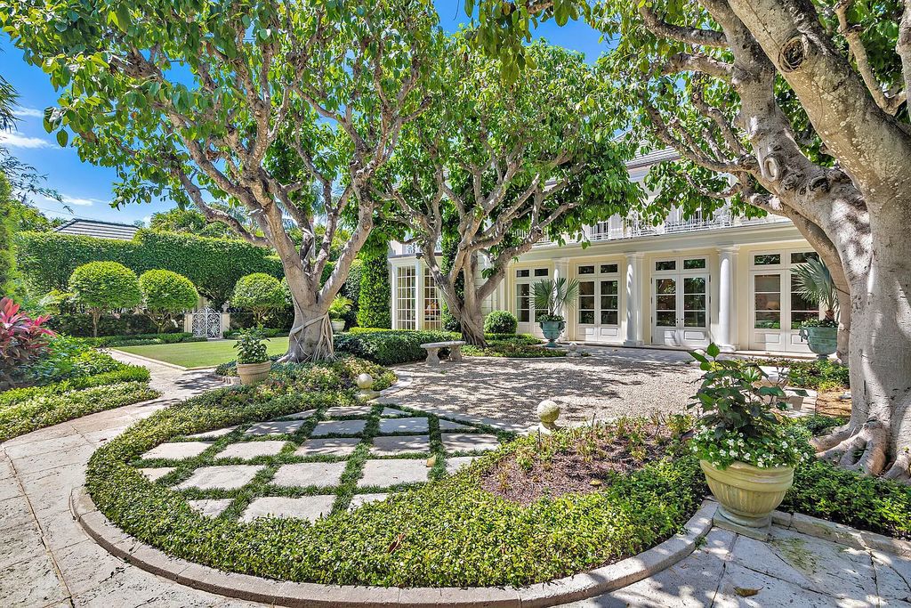 Welcome to 120 Via Del Lago, Palm Beach, Florida a Marion Sims Wyeth designed classic masterpiece. This 13,000+ sq ft Estate boasts 7 beds, 12 baths, expansive indoor/outdoor living areas, gardens, pool and separate guest house.