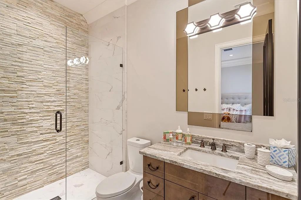 Live in luxury at the Four Seasons Private Residences 10242 Summer Meadow Way in Golden Oak, Orlando, Florida.