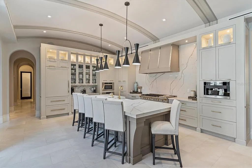 Live in luxury at the Four Seasons Private Residences 10242 Summer Meadow Way in Golden Oak, Orlando, Florida.