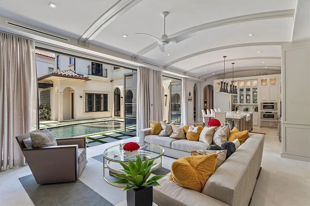 Live in luxury at the Four Seasons Private Residences 10242 Summer Meadow Way in Golden Oak, Orlando, Florida.