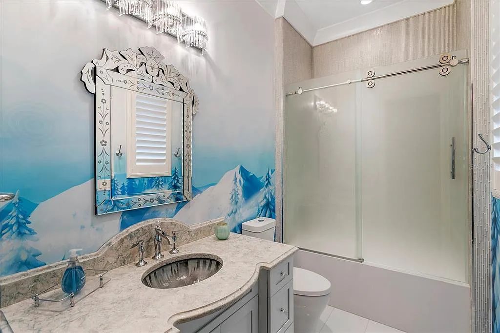 Live in luxury at the Four Seasons Private Residences 10242 Summer Meadow Way in Golden Oak, Orlando, Florida.